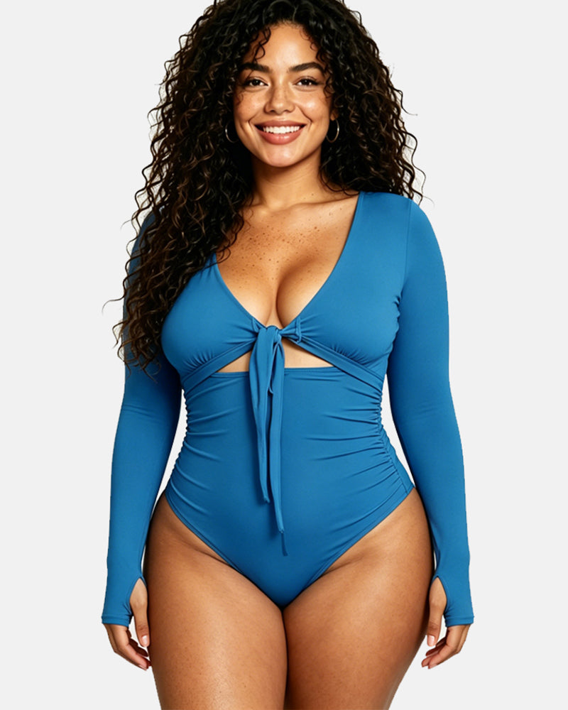 Long sleeve swimsuit with zipper and built in abdominal control and shaping futures
