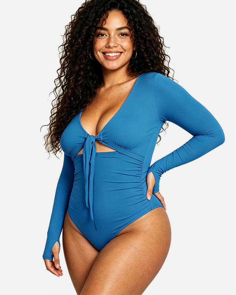 Long sleeve swimsuit with zipper and built in abdominal control and shaping futures