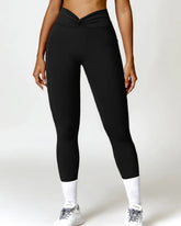 Gedrehter Taille Schnell trocknende Po-Lift Leggings mit Seitentasche Yogahose