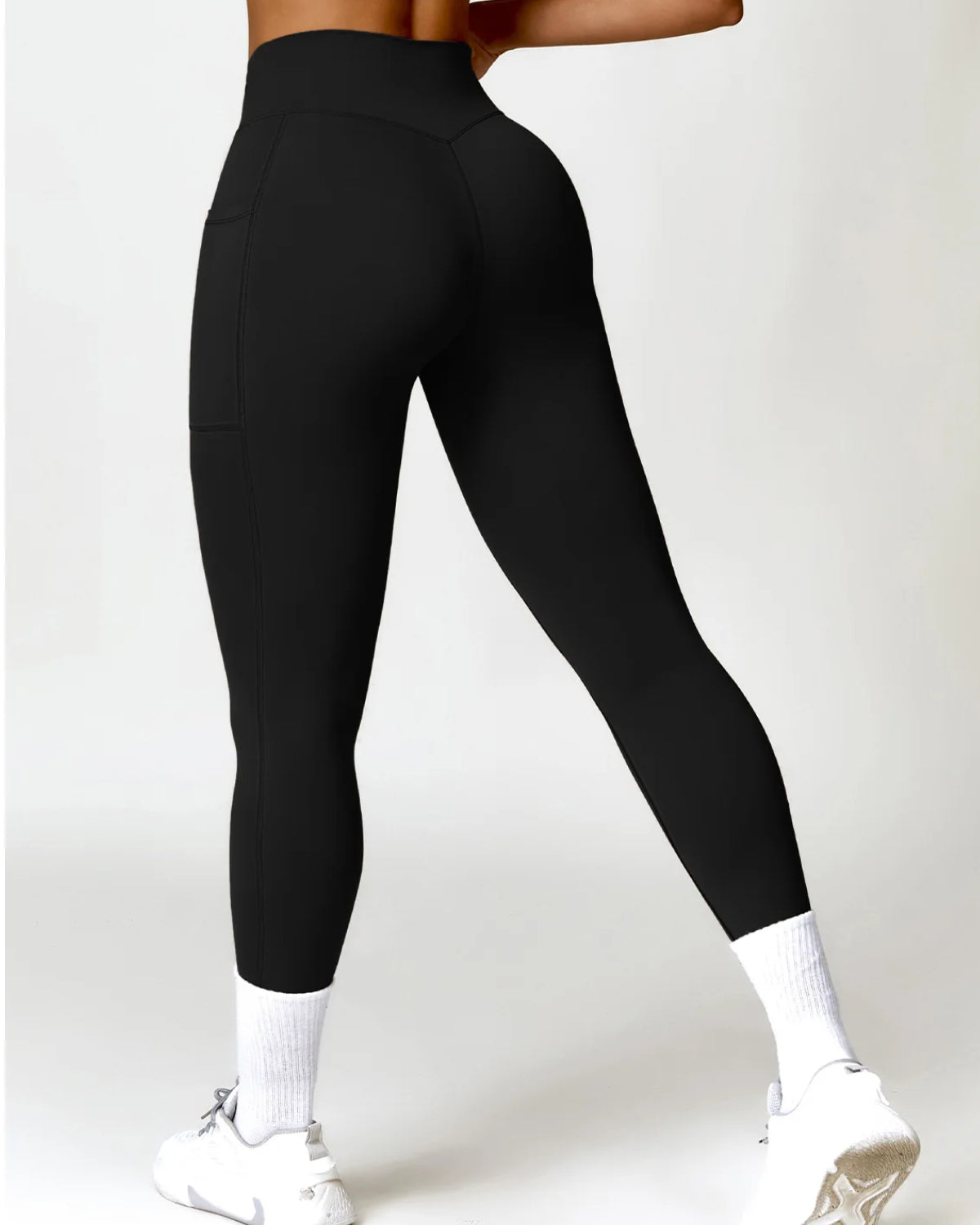 Gedrehter Taille Schnell trocknende Po-Lift Leggings mit Seitentasche Yogahose